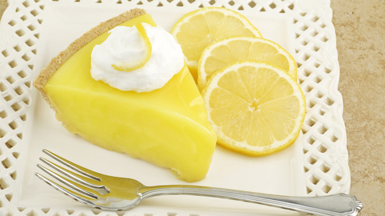 Lemon pie slice with fork