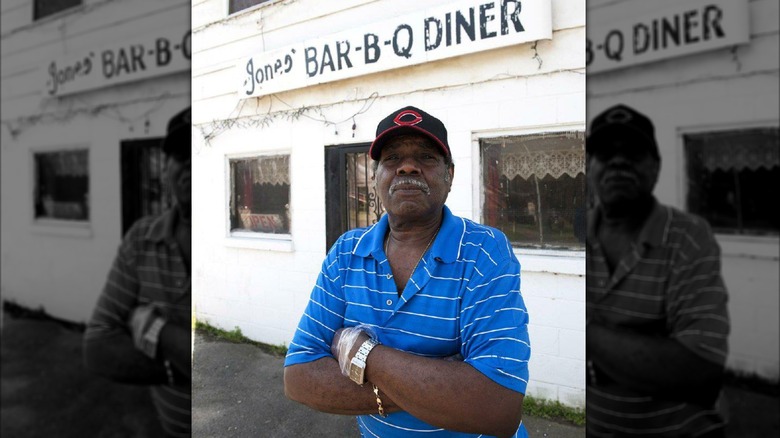 James Jones in front of Jones Bar-B-Q Diner