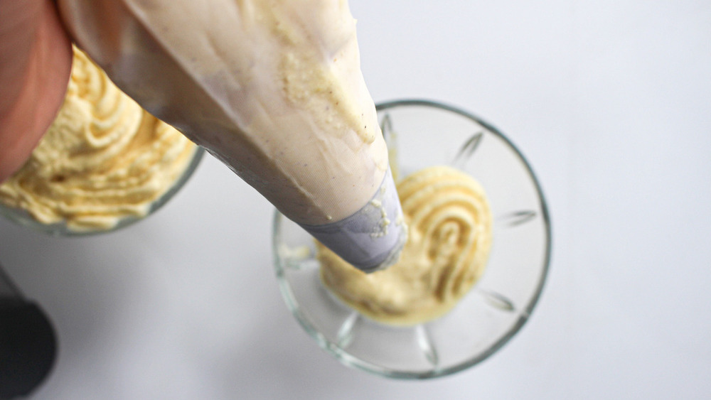 Dole Whip being piped into glasses