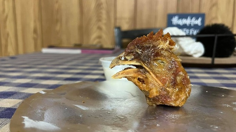 A photo of the fried chicken head found in Brittani Paulhamus's order