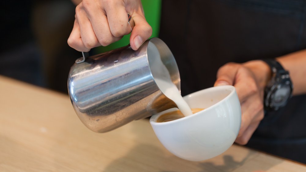 barista with drink