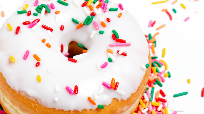 Vanilla frosted donut with sprinkles