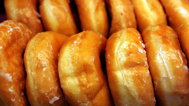 Two rows of glazed donuts