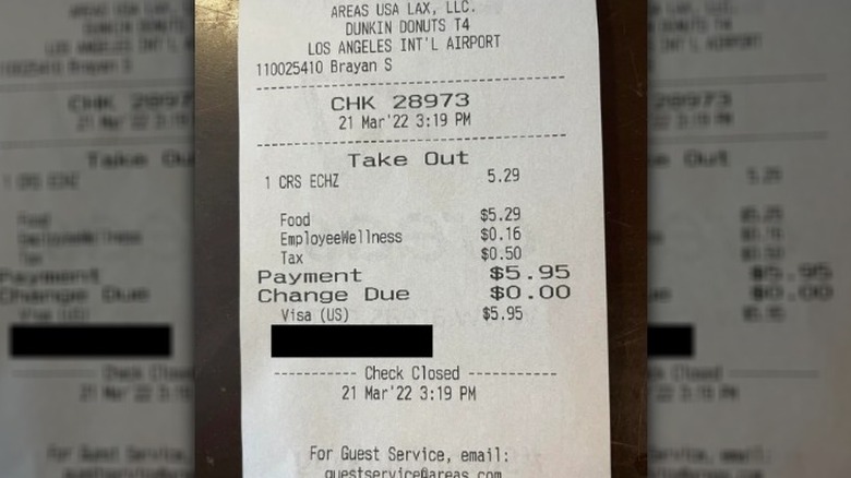 Dunkin' receipt with employee wellness charge