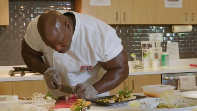 Chef Andre Rush prepares a meal 