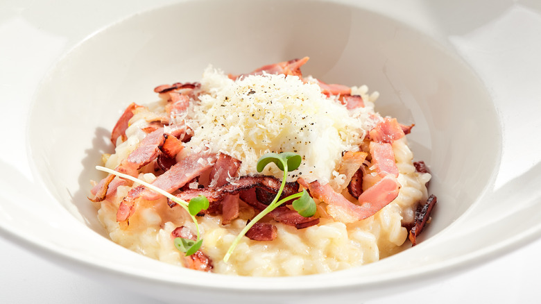 Risotto with bacon and cheese on top