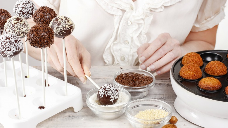 Person making cake pops