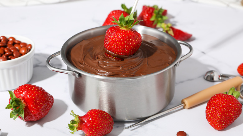 Chocolate fondue with fresh strawberries