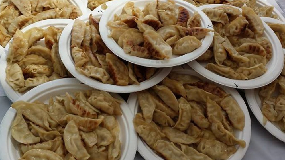 Plates full of gyoza, a type of Japanese dumpling