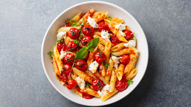 bowl of pasta with tomatoes