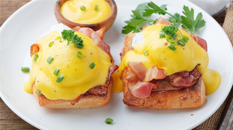 Classic eggs Benedict on a white plate