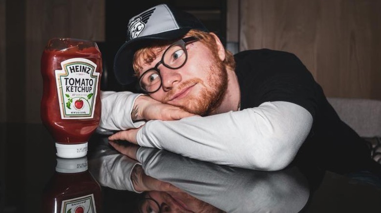 Ed Sheeran gazing lovingly at Heinz ketchup