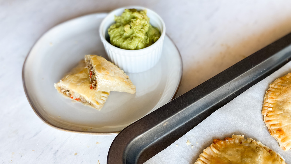 Empanadas served on a plate and platter