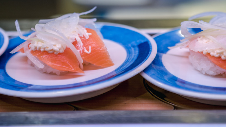 Plates of conveyor belt sushi