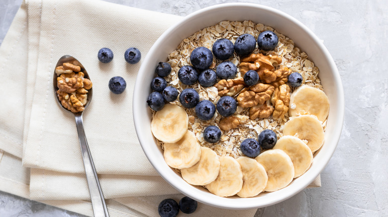 Oatmeal with fruit and nuts in bowl