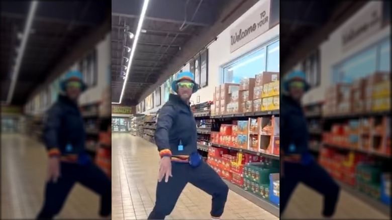 josh gillett dances in aldi in aldi gear