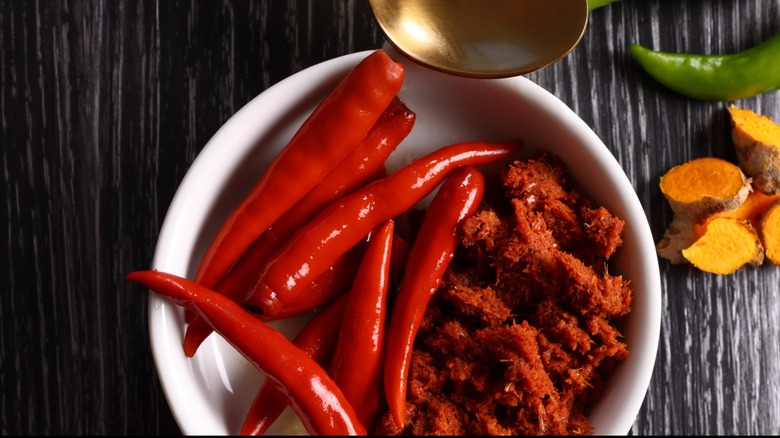 chilis and chili powder in bowl