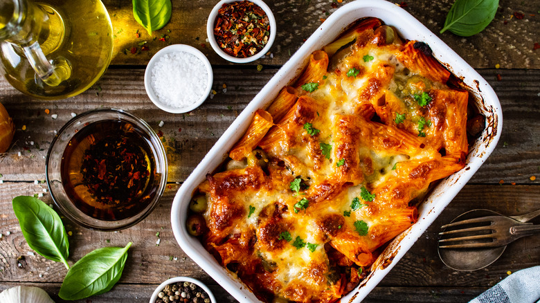 Large casserole on wooden tabletop 