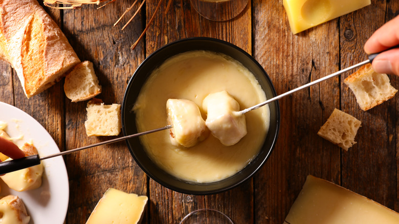 Cheese fondue in a pot
