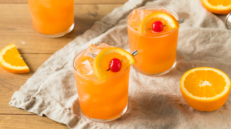 Orange rum swizzles.