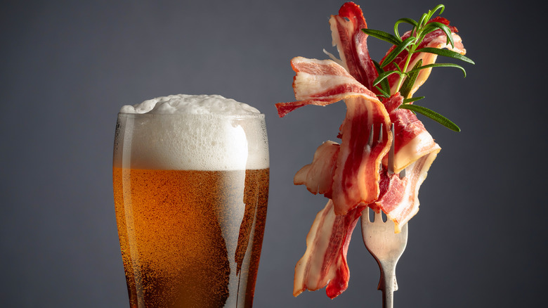 glass of beer and bacon strips