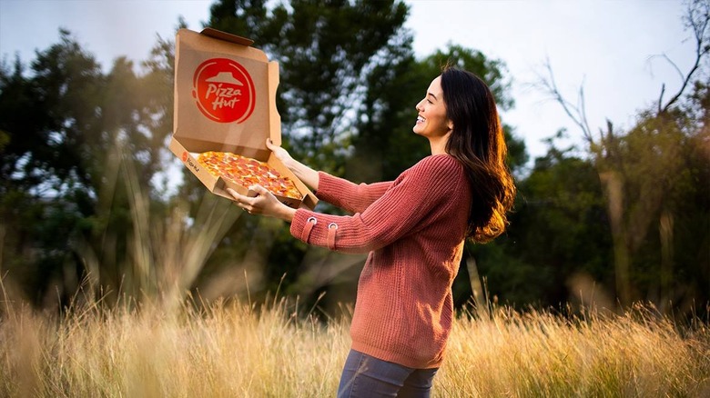 Woman embracing Pizza Hut