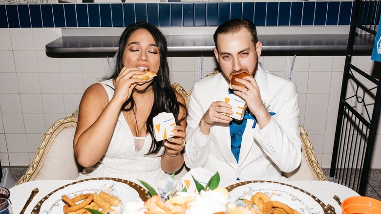 Bridal couple eating white castle