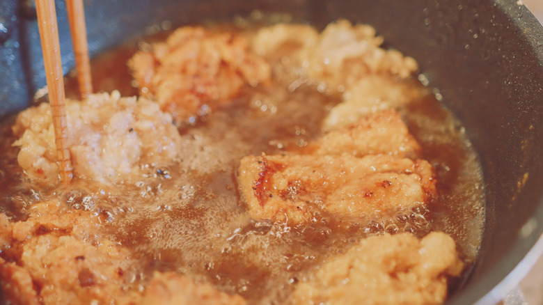 frying chicken in oil