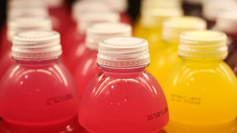 Bottles of colored beverages