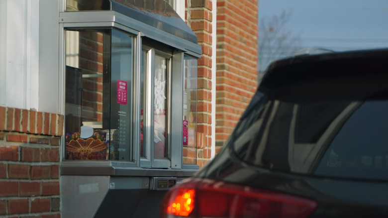 car at drive-thru window