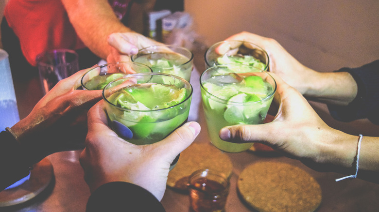 Toasting with caipirinhas