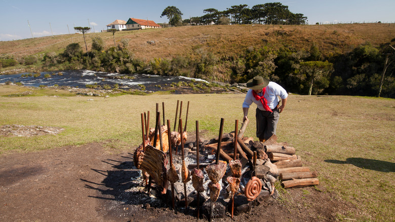 Gaúcho tending the fire