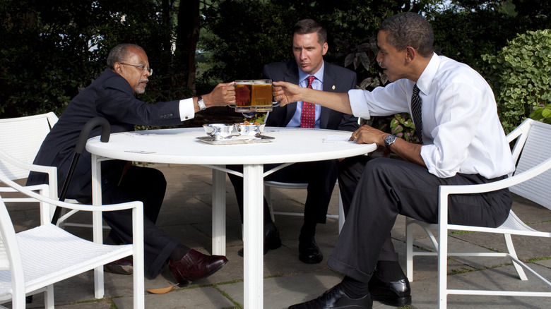 University Professor Henry Louis Gates, Cambridge Police Sgt. James Crowley and President Barack Obama drink beer in the Rose Garden at the White House