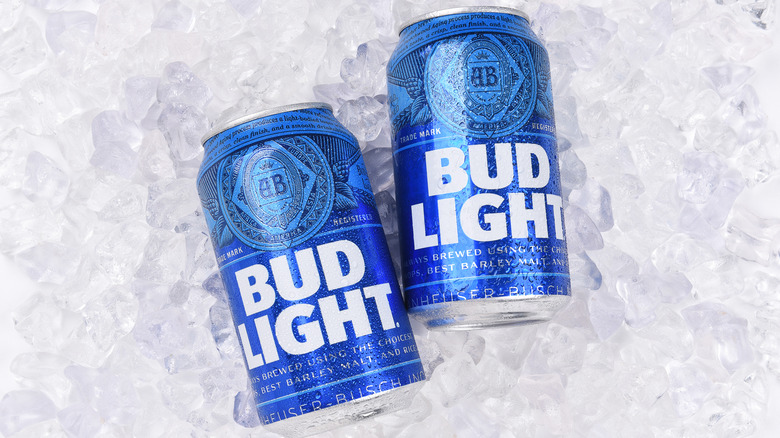 Two cans of Bud Light on ice