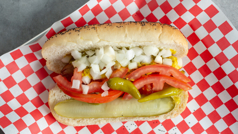 Chicago style hot dog on checkered paper