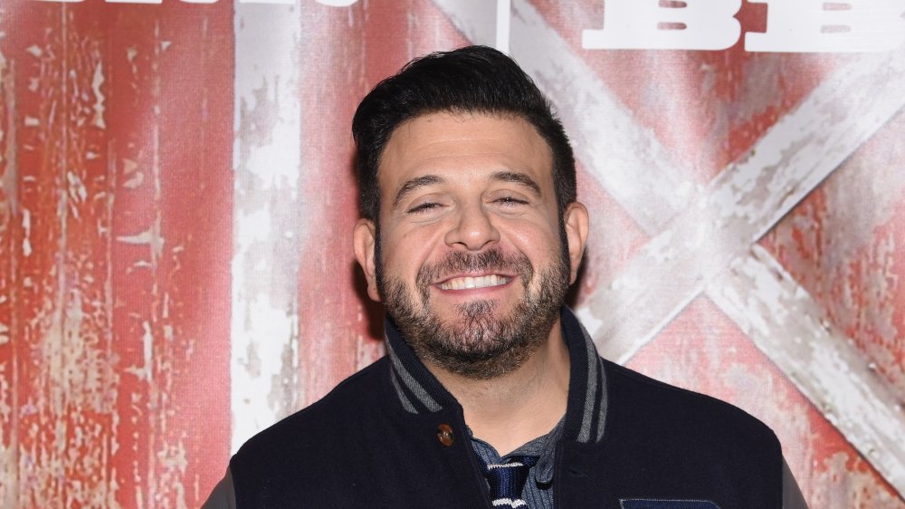 Smiling Adam Richman