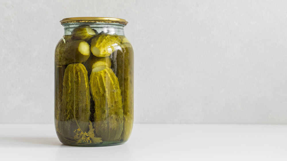 Dill pickles in a jar