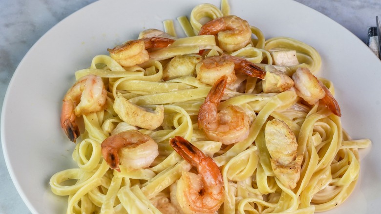 Plate of fettuccine Alfredo with shrimp