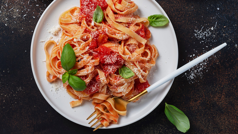 pasta with tomatoes and grated cheese