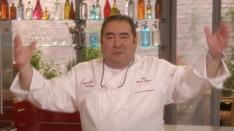 emeril's table emeril lagasse arms up