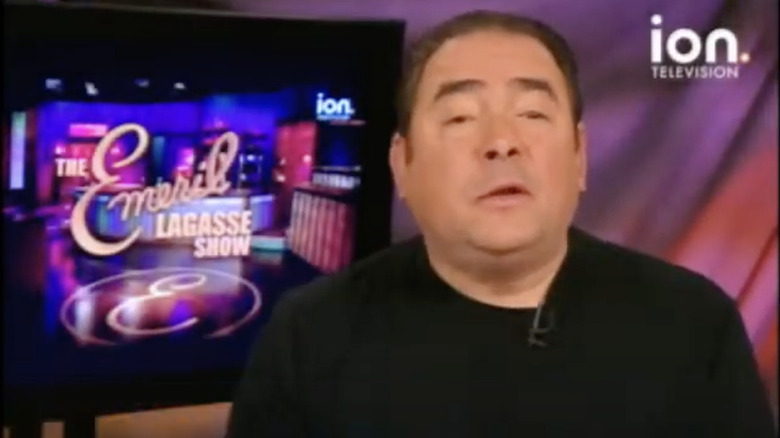 emeril lagasse talking by tv monitor