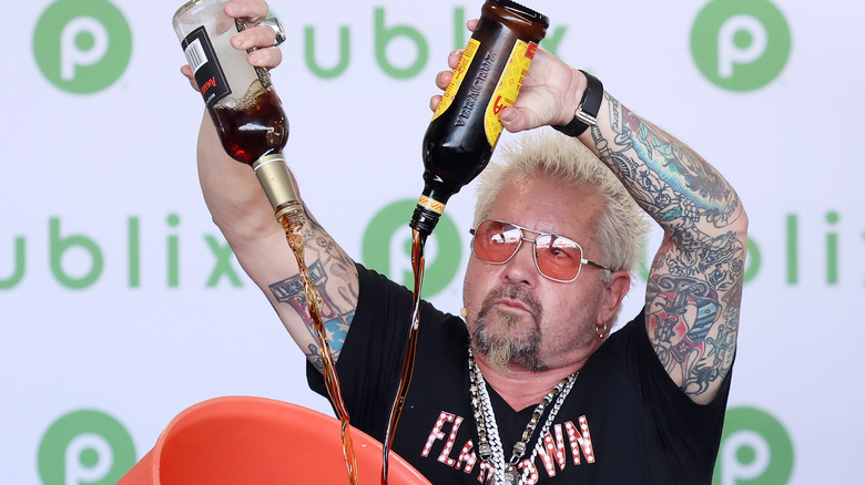 Guy Fieri making a drink