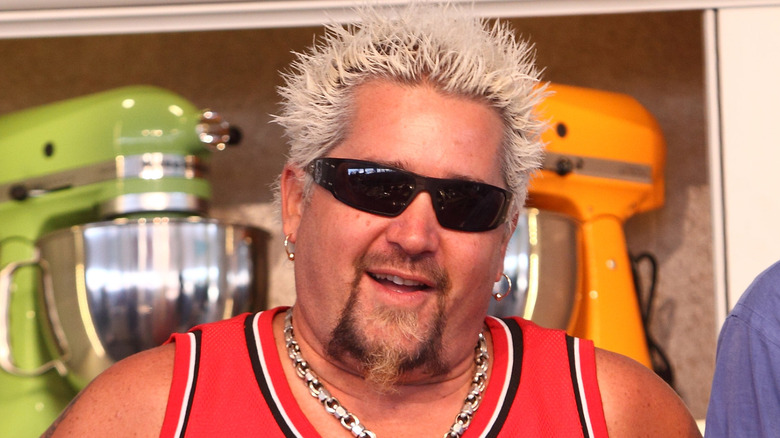 Guy Fieri onstage cooking