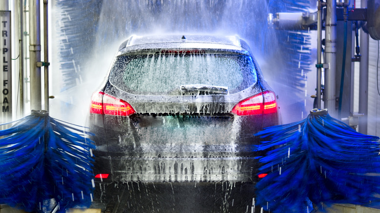 Car driving through car wash