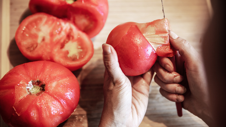 peeling tomato with a knife