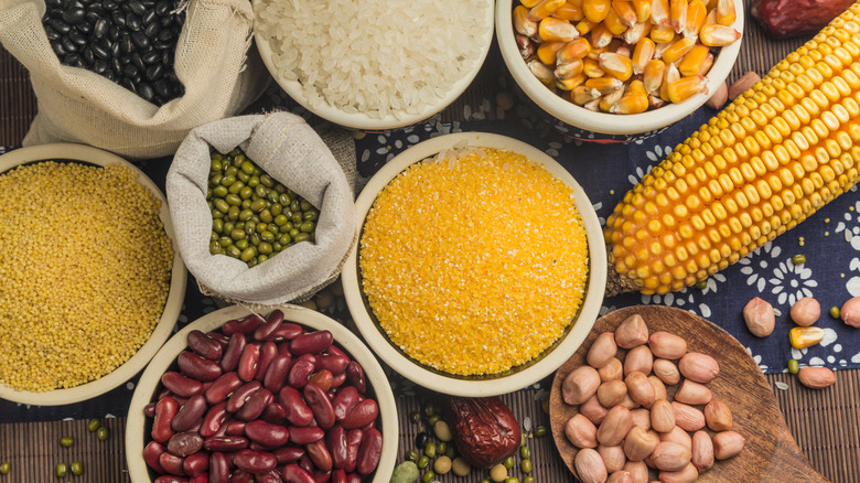 Bowls of grains, beans, corn