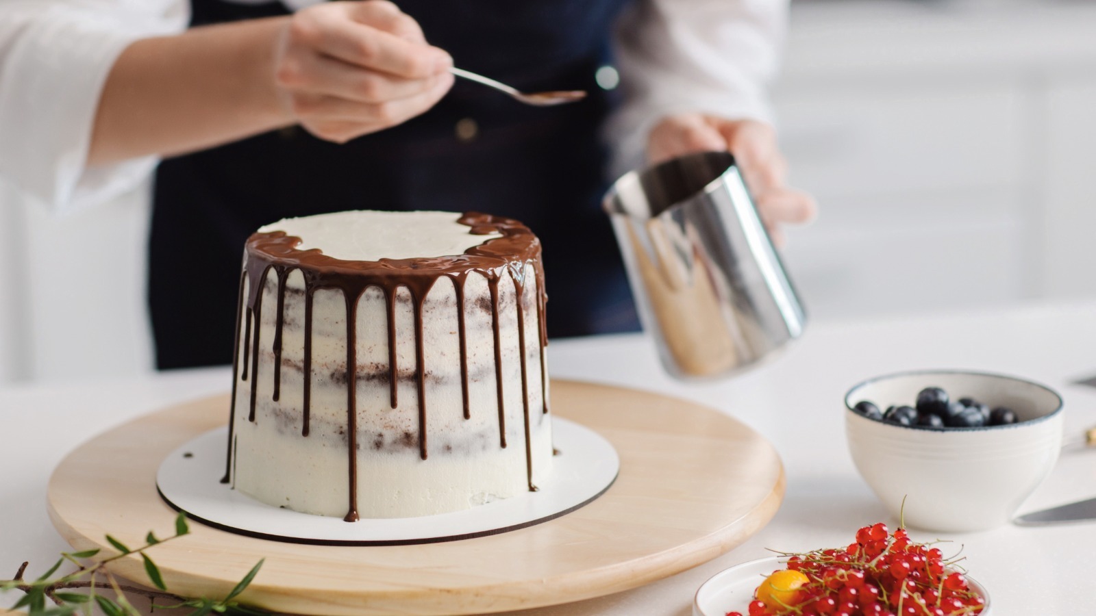 pastry-chef-at-work-in-professional-kitchen-makes-apricot-jam-for-the