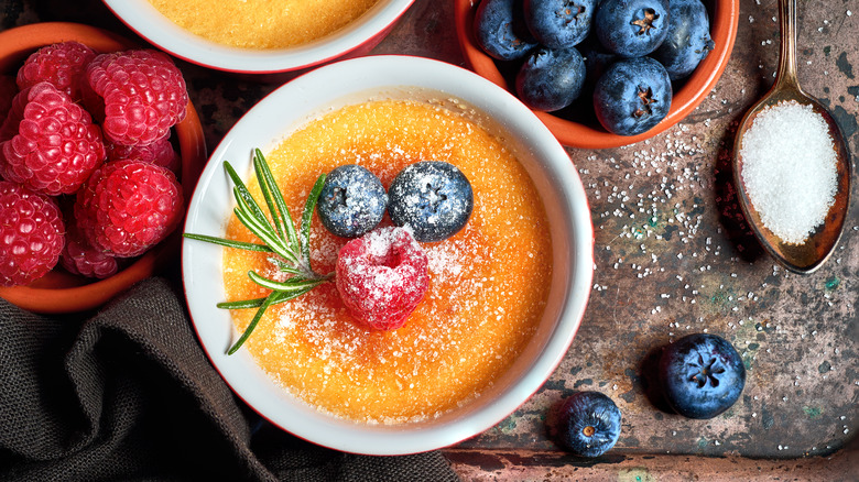 crème brûlée topped with berries