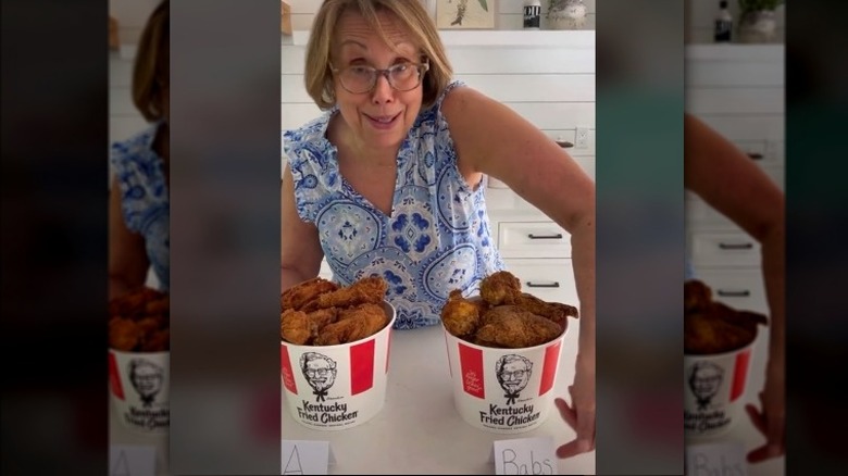 Babs Costello with two buckets chicken