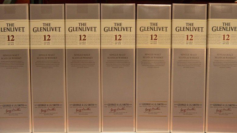 Bottles of The Glenlivet 12 on a shelf 